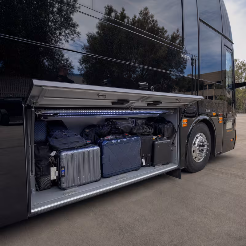 Party bus interior with wraparound leather seating and LED lighting in New Orleans