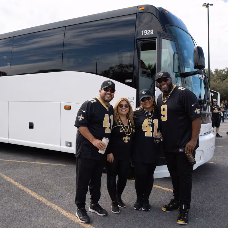 Passengers loading luggage while boarding an New Orleans group shuttle